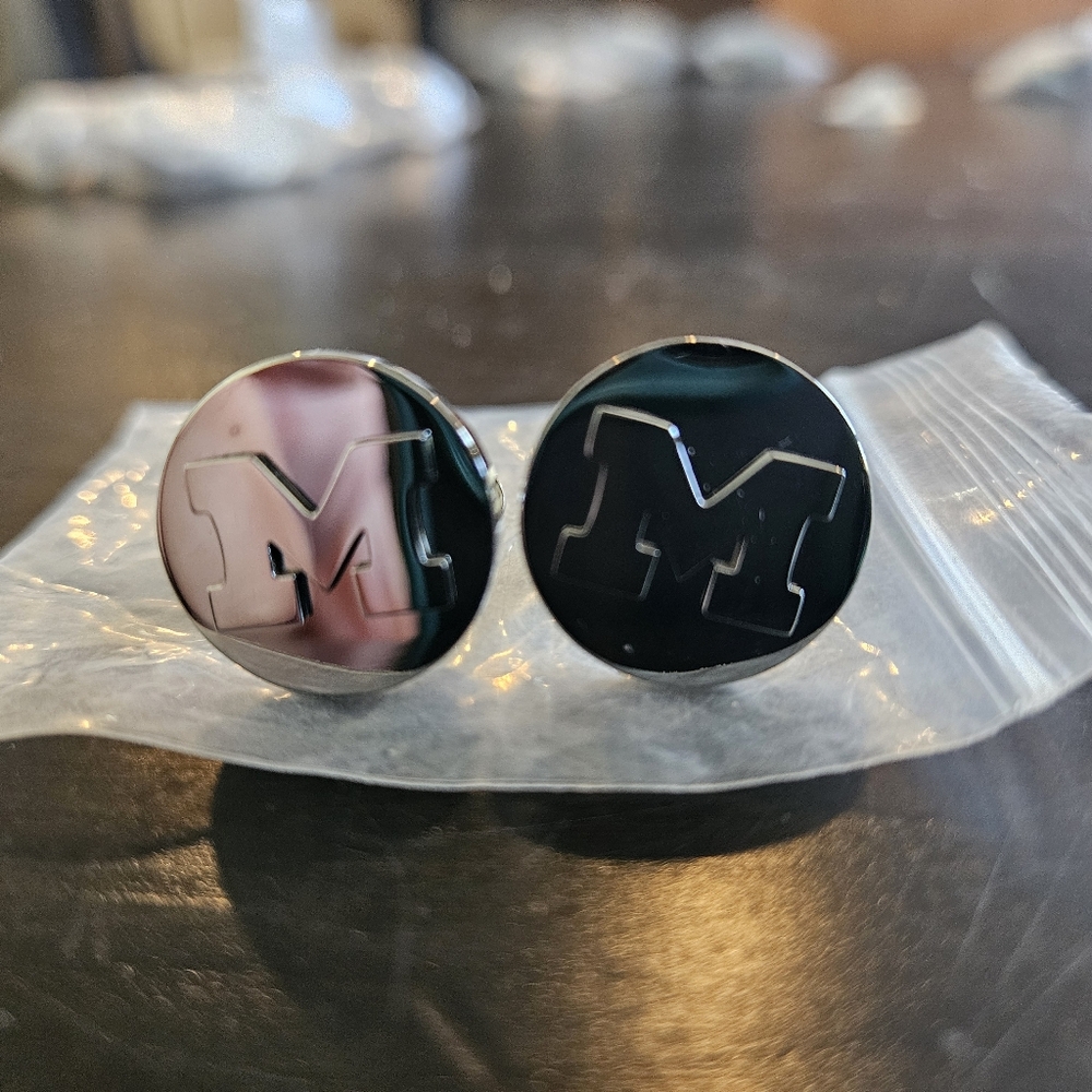 brand new set of Michigan wolverine cuff links.   retail $70,    stainless steel